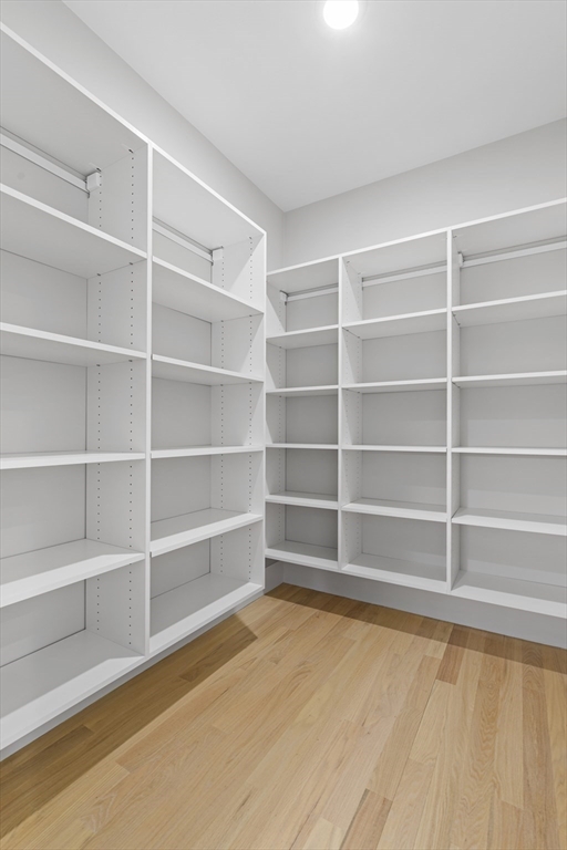 78 Morningside Road Needham, MA 02492 - Photo 14 of 38 a view of an empty room with empty racks