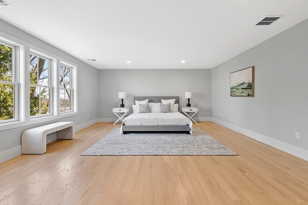78 Morningside Road Needham, MA 02492 - Photo 17 of 38 a spacious bedroom with a large bed and a window