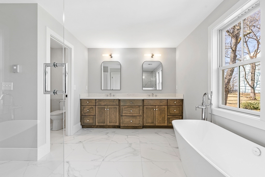 78 Morningside Road Needham, MA 02492 - Photo 20 of 38 a bathroom with a tub sink and mirror
