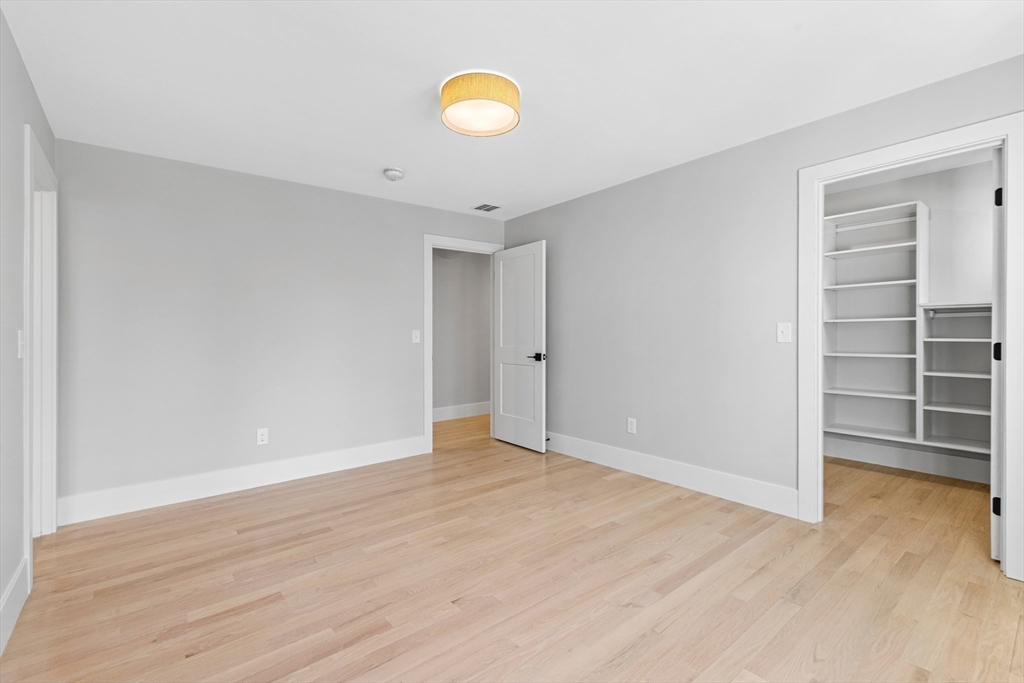 78 Morningside Road Needham, MA 02492 - Photo 24 of 38 a view of an empty room with wooden floor and window