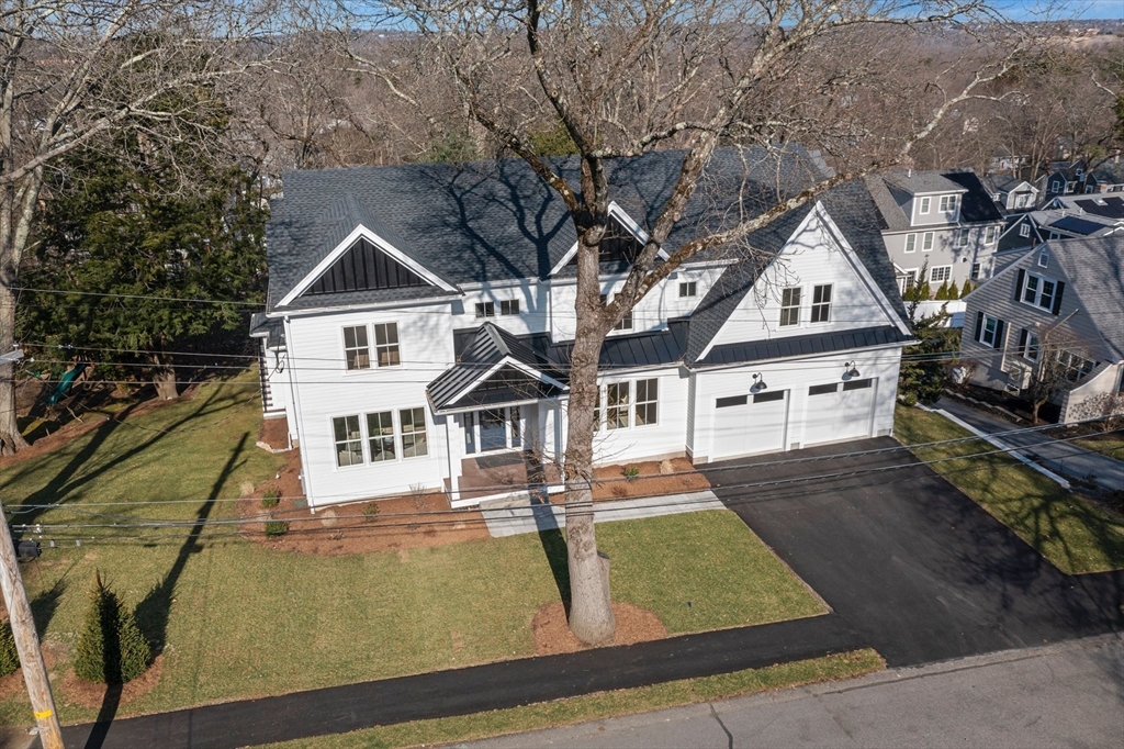 78 Morningside Road Needham, MA 02492 - Photo 37 of 38 a front view of a house with garden