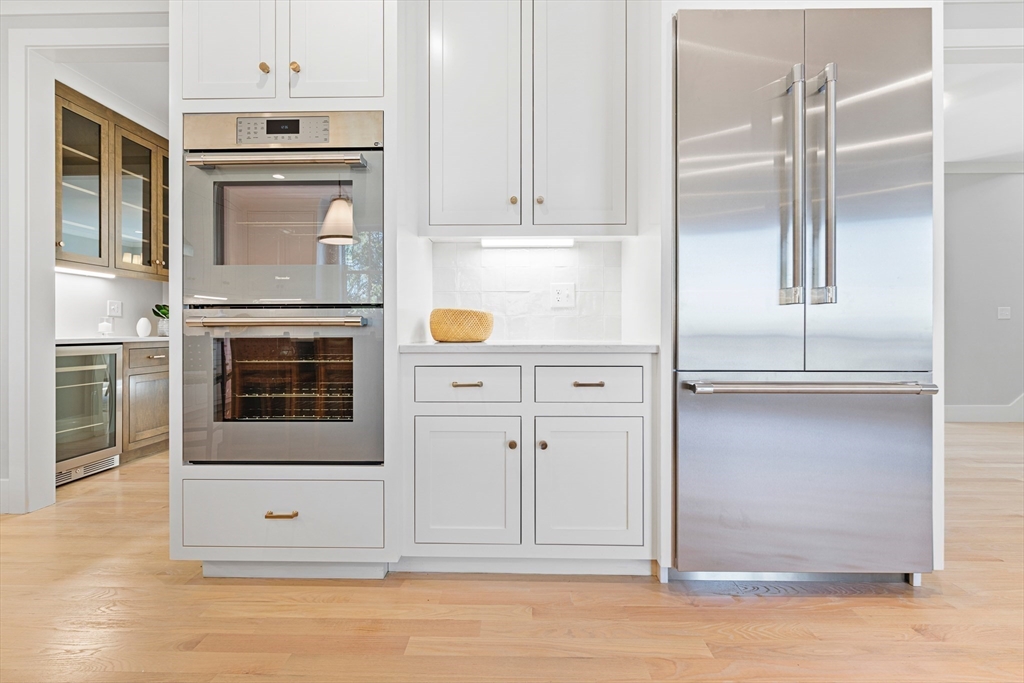 78 Morningside Road Needham, MA 02492 - Photo 8 of 38 a stove top oven sitting inside of a kitchen