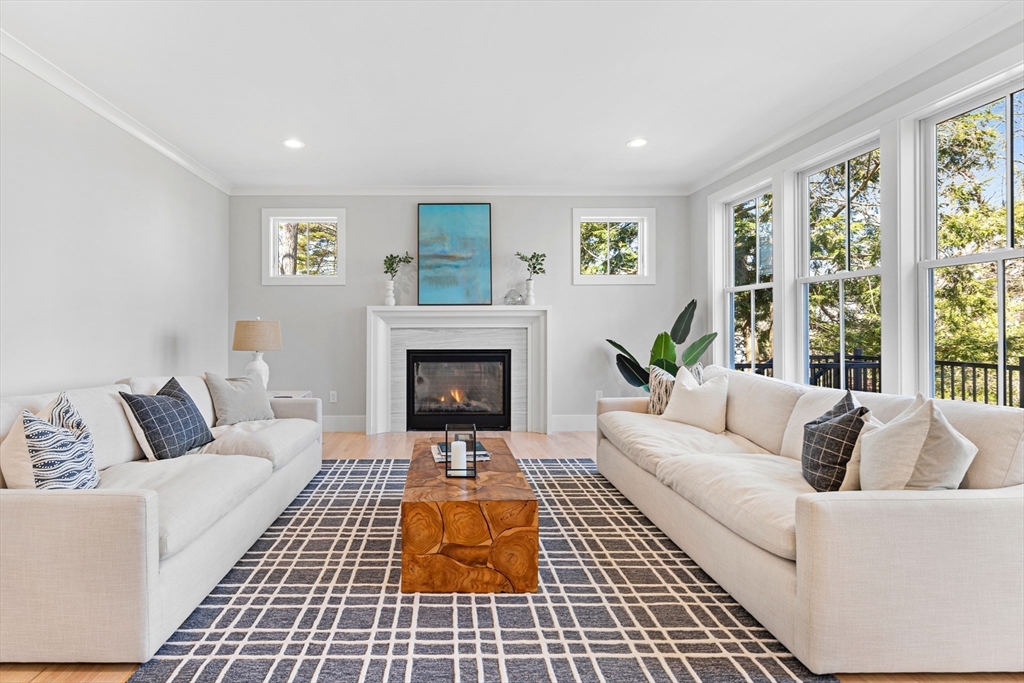 78 Morningside Road Needham, MA 02492 - Photo 10 of 38 a living room with furniture and a fireplace
