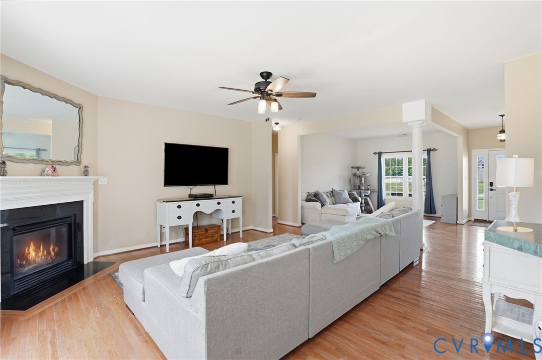 5305 Wellington Ridge Road Richmond, VA 23231 - Photo 12 of 67 Living area featuring wood-finish flooring, a whit