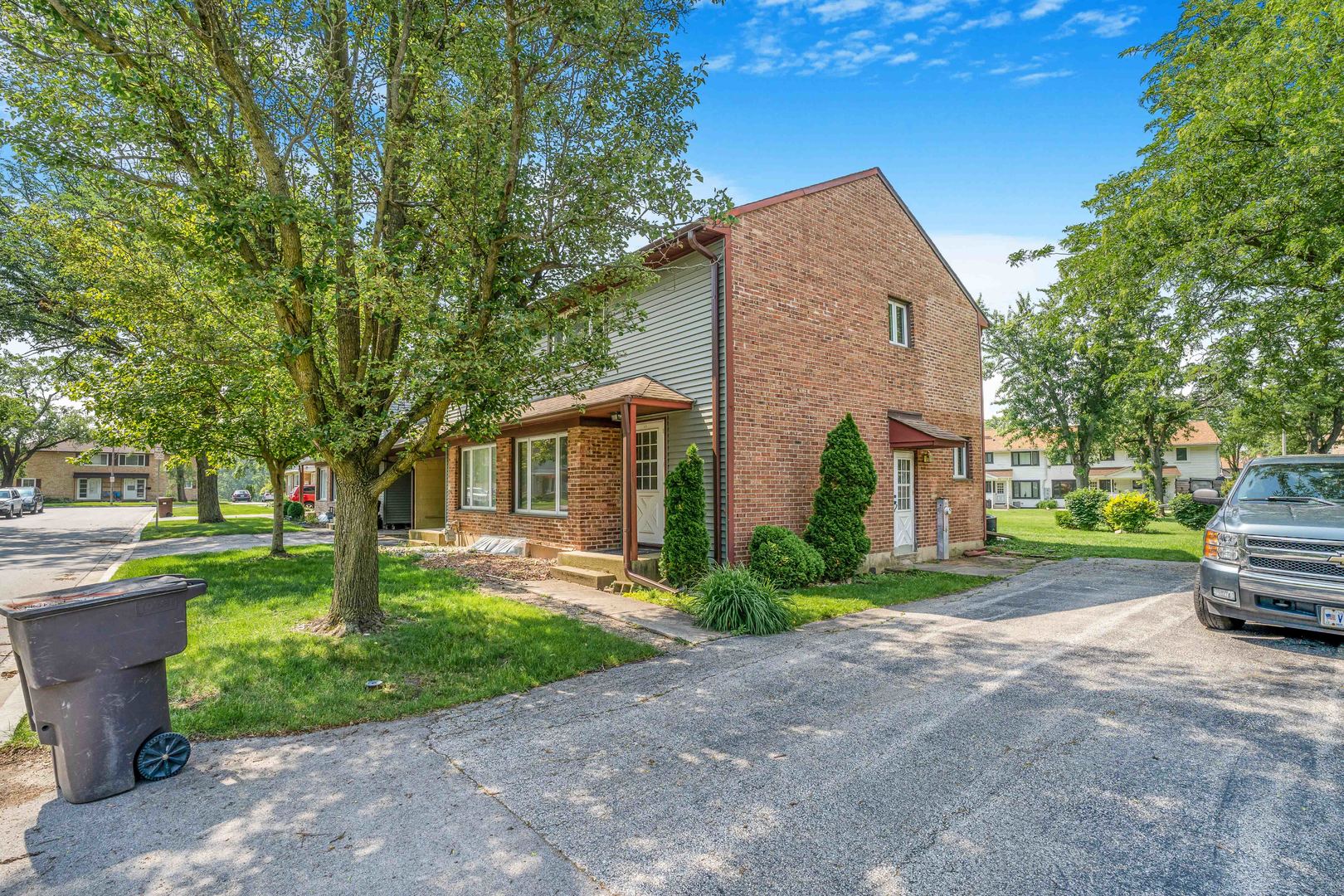 17 Michael Road Park Forest, IL 60466 - Photo 3 of 5 a view of a house with garden and trees