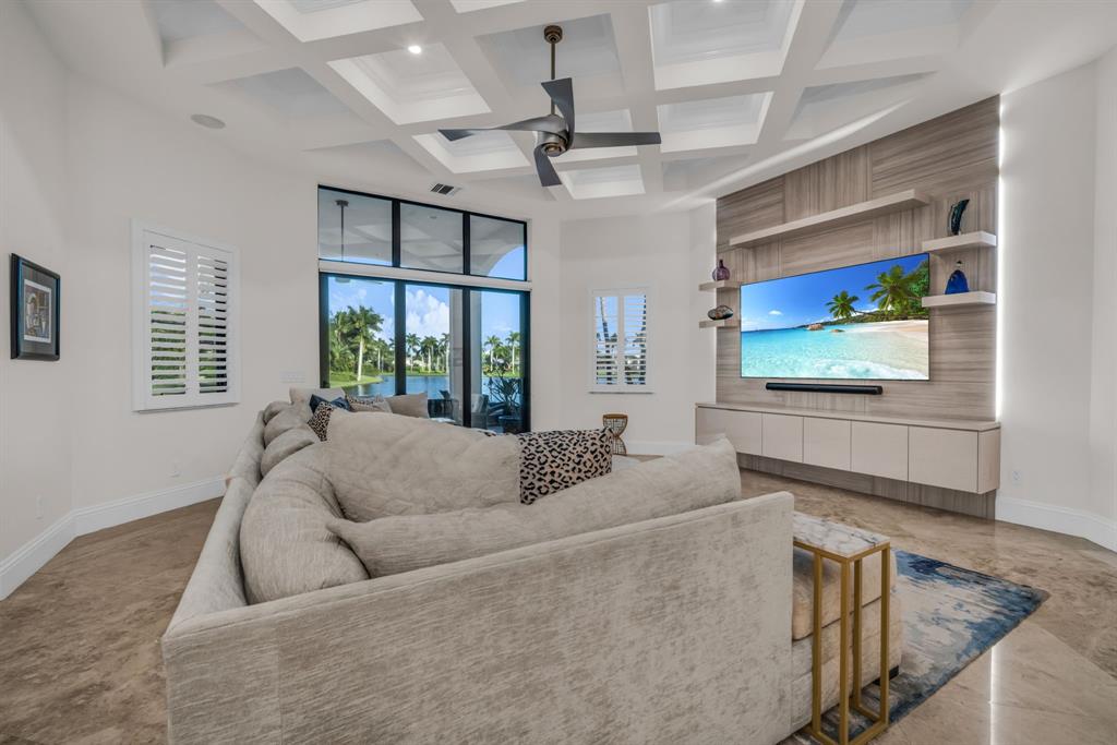 7328 Ballantrae Court Boca Raton, FL 33496 - Photo 13 of 89 a living room with furniture and a flat screen tv