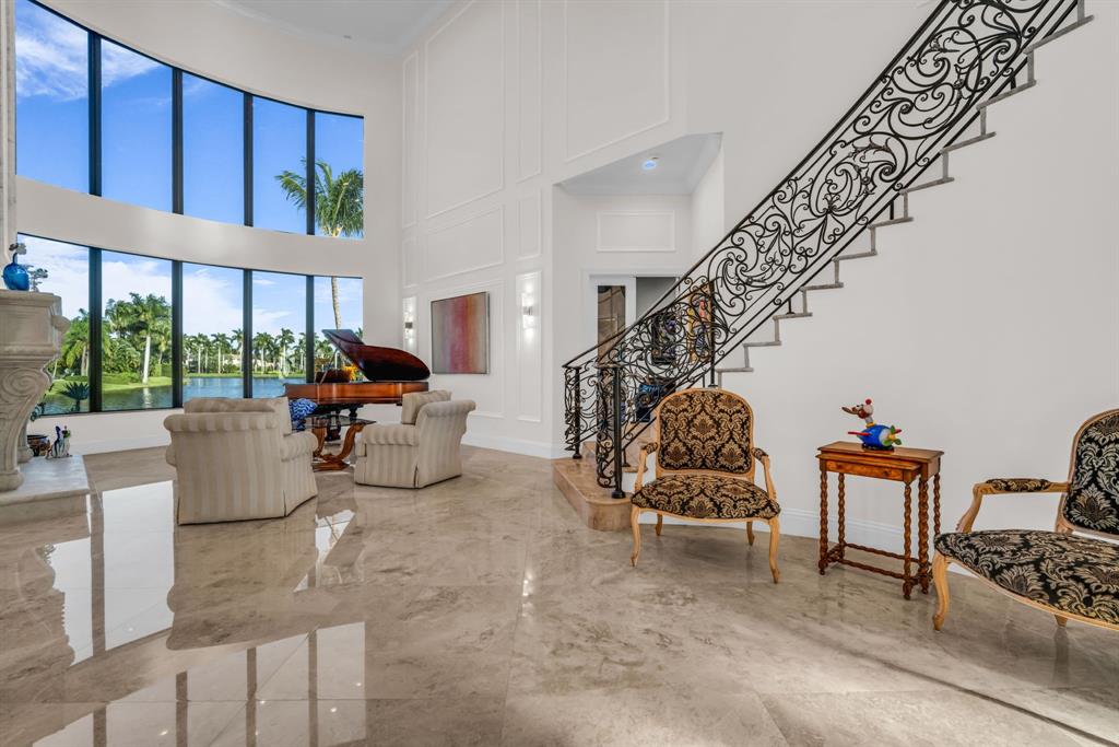7328 Ballantrae Court Boca Raton, FL 33496 - Photo 18 of 89 a living room with furniture and a potted plant