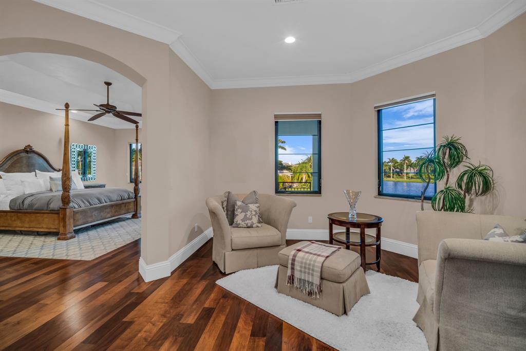 7328 Ballantrae Court Boca Raton, FL 33496 - Photo 36 of 89 a living room with furniture and a gate