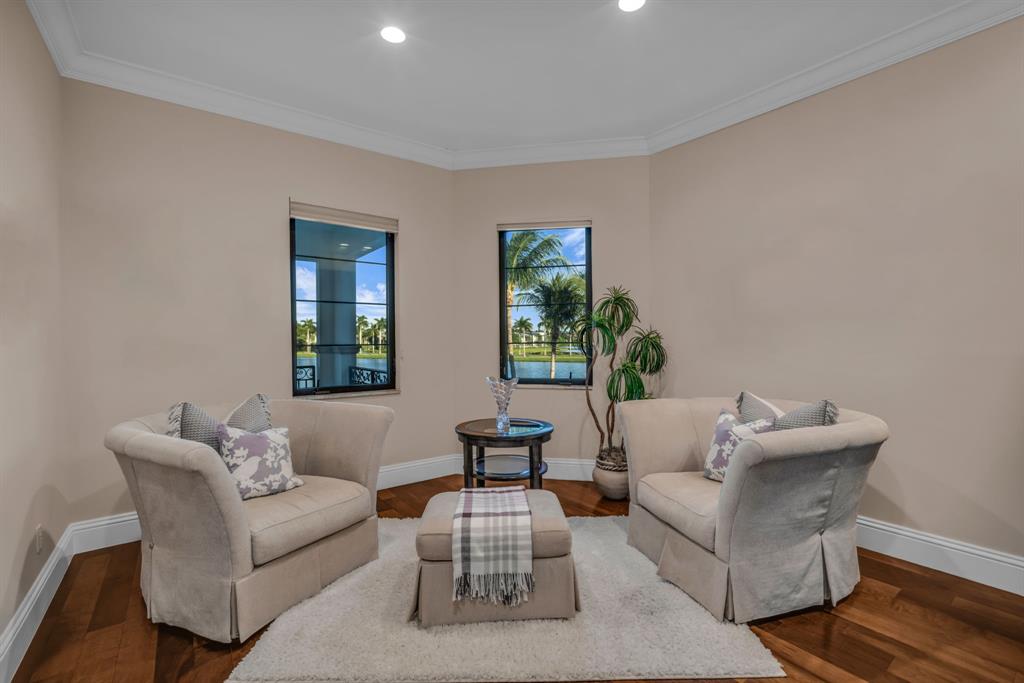 7328 Ballantrae Court Boca Raton, FL 33496 - Photo 37 of 89 a living room with furniture and a potted plant