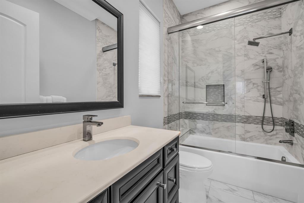 7328 Ballantrae Court Boca Raton, FL 33496 - Photo 48 of 89 a bathroom with a sink and a mirror