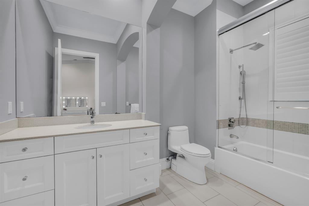 7328 Ballantrae Court Boca Raton, FL 33496 - Photo 50 of 89 a bathroom with a double vanity sink toilet mirror and bathtub