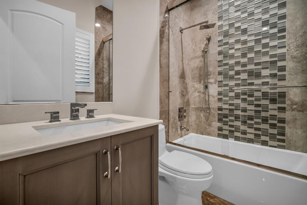 7328 Ballantrae Court Boca Raton, FL 33496 - Photo 54 of 89 a bathroom with a sink a toilet and shower
