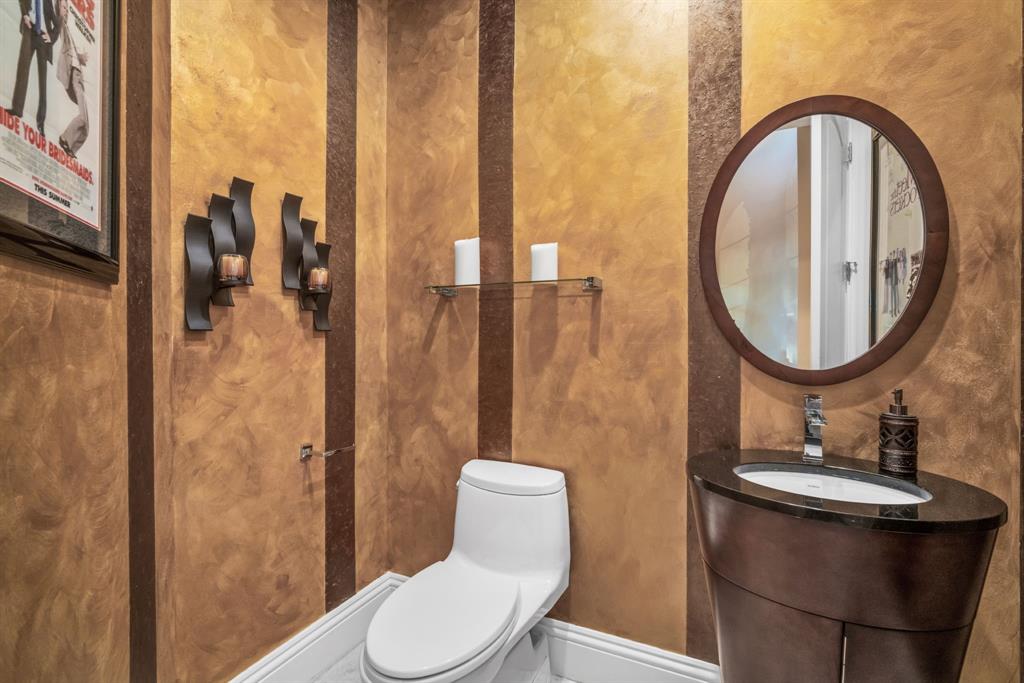 7328 Ballantrae Court Boca Raton, FL 33496 - Photo 55 of 89 a bathroom with a toilet a sink and a mirror