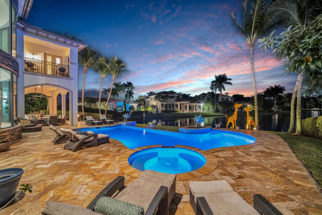 7328 Ballantrae Court Boca Raton, FL 33496 - Photo 69 of 89 a view of a swimming pool with outdoor seating