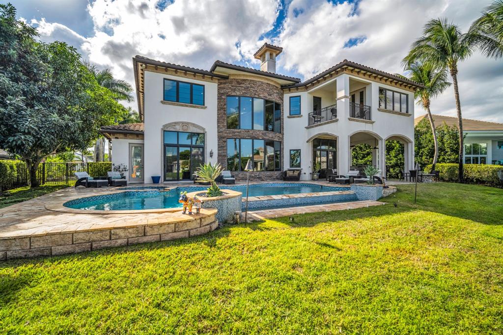 7328 Ballantrae Court Boca Raton, FL 33496 - Photo 75 of 89 a front view of house with yard and swimming pool