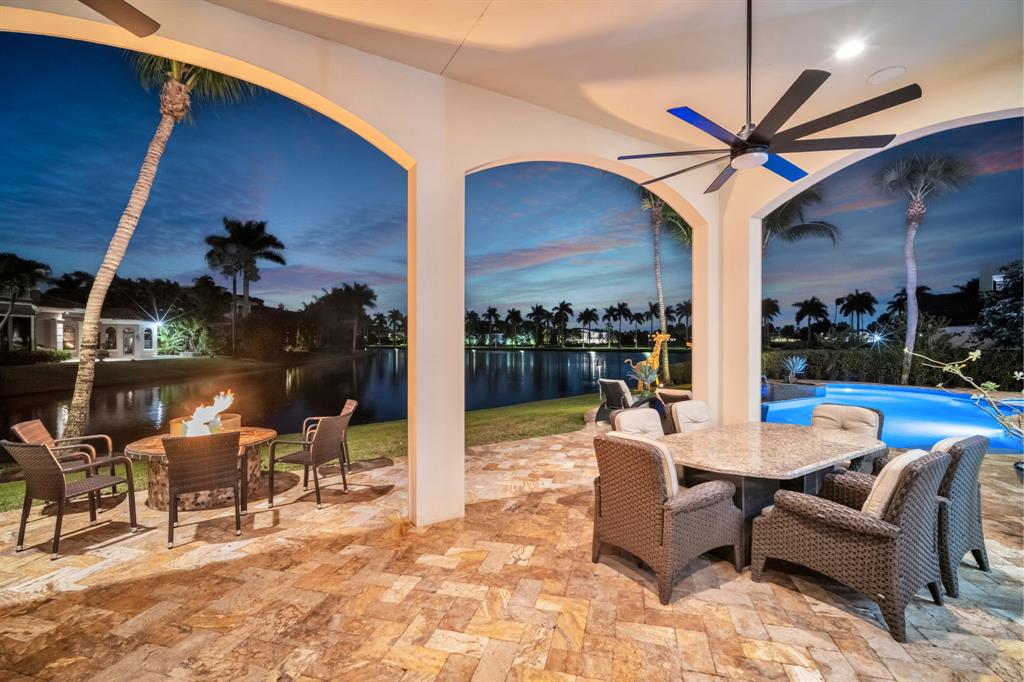7328 Ballantrae Court Boca Raton, FL 33496 - Photo 77 of 89 a view of a patio with a dining table and chairs