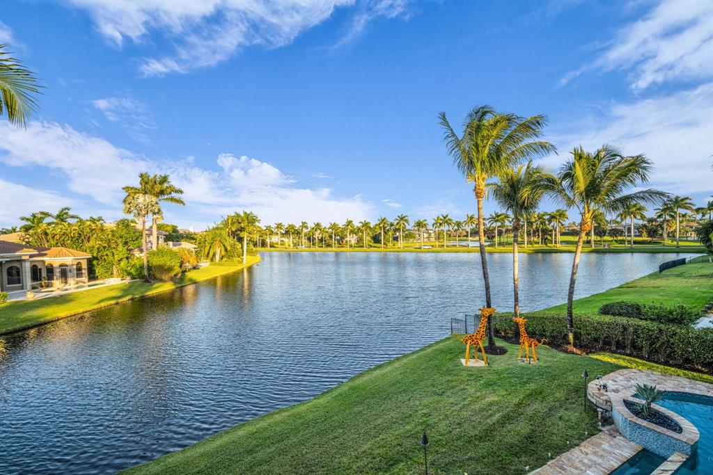 7328 Ballantrae Court Boca Raton, FL 33496 - Photo 85 of 89 a view of a lake with houses in the back