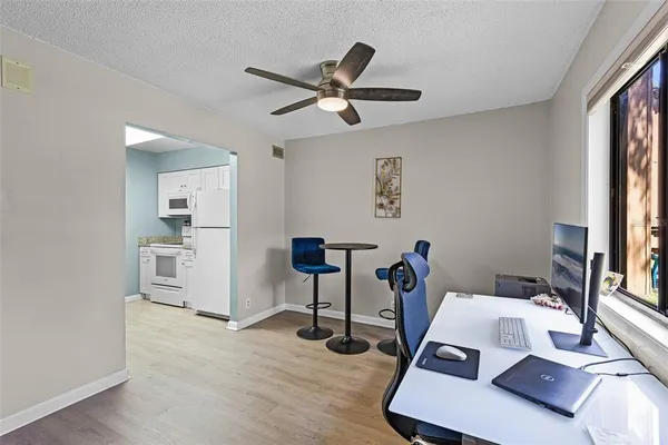 a room with furniture and a window
