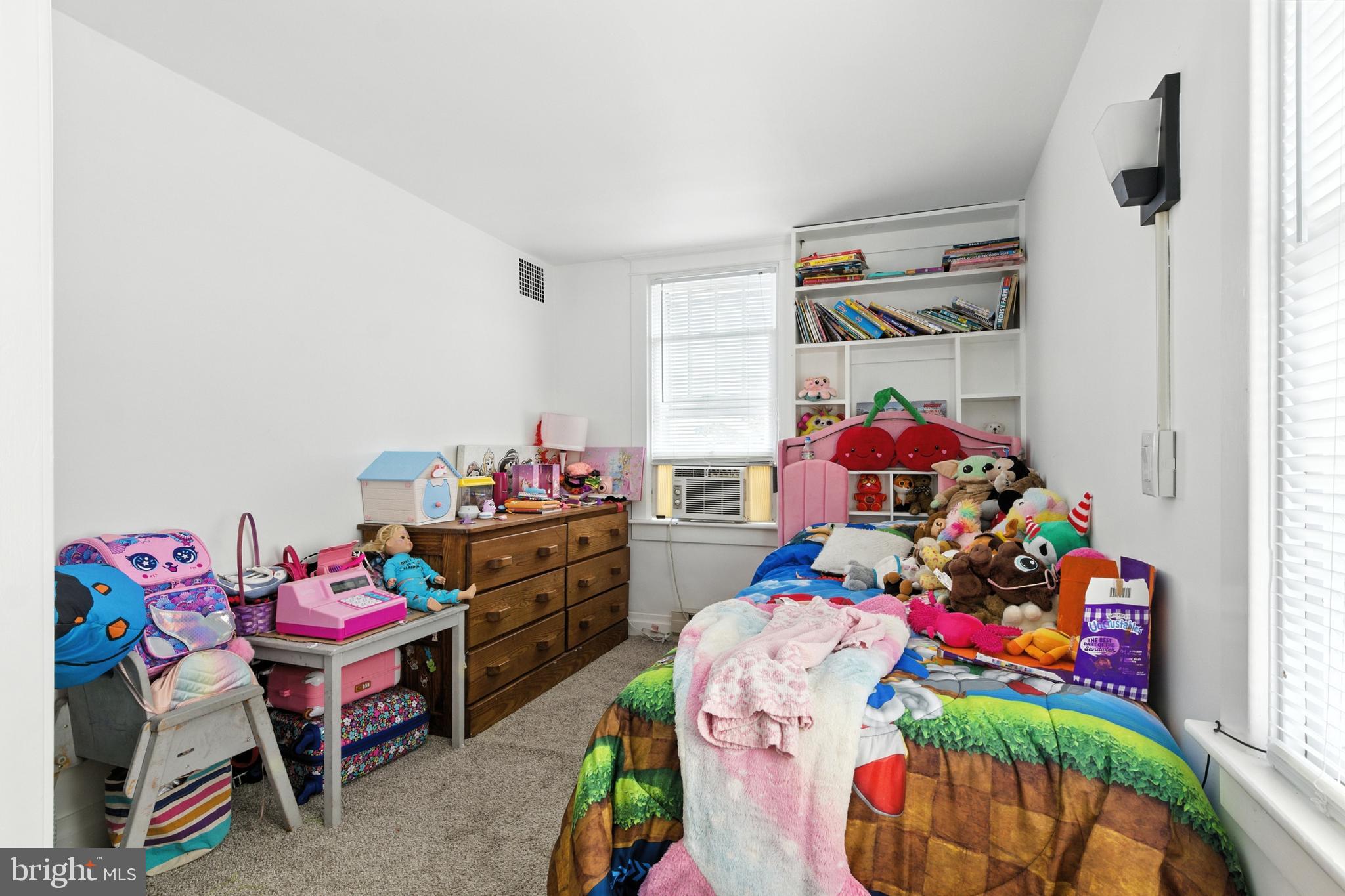 1745 Filbert Street York, PA 17404 - Photo 14 of 26 a bedroom with a bed and dresser