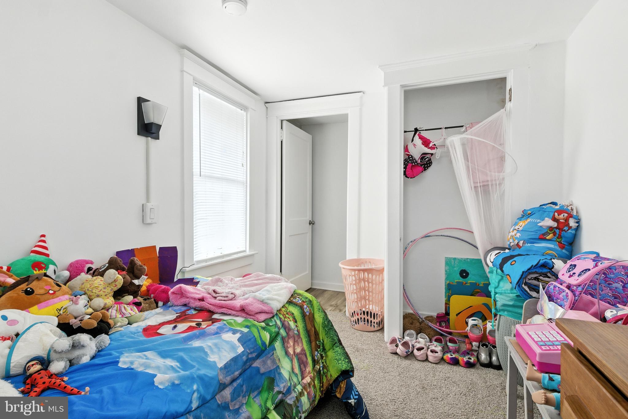 1745 Filbert Street York, PA 17404 - Photo 15 of 26 a bedroom with a bed and a window