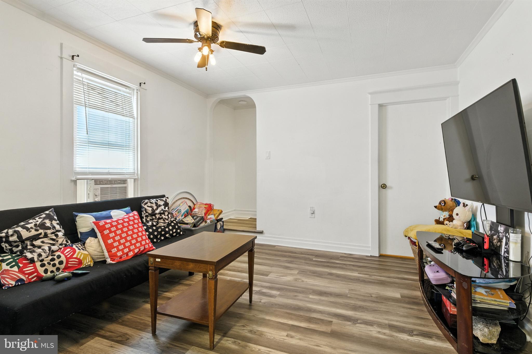 1745 Filbert Street York, PA 17404 - Photo 5 of 26 a living room with furniture and a flat screen tv