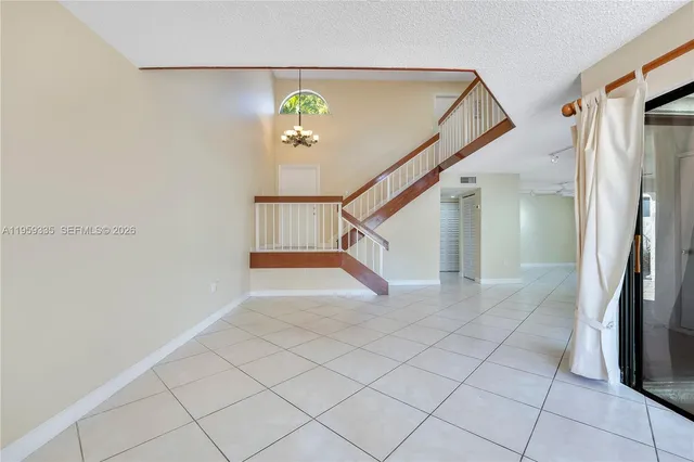 a view of a hallway with entryway