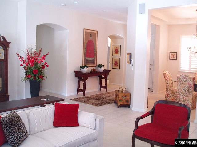 1795 Hunter Creek Road Reno, NV 89519 - Photo 5 of 9 a living room with furniture and flowers
