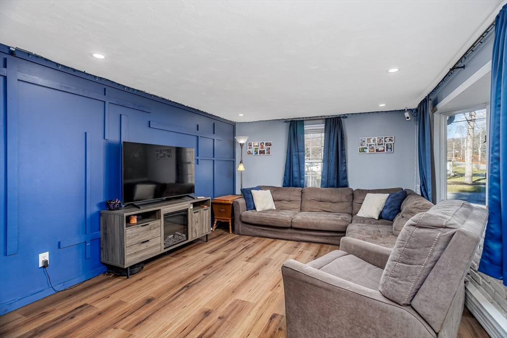 18 Corey Hill Road Ashburnham, MA 01430 - Photo 14 of 40 a living room with furniture and a flat screen tv