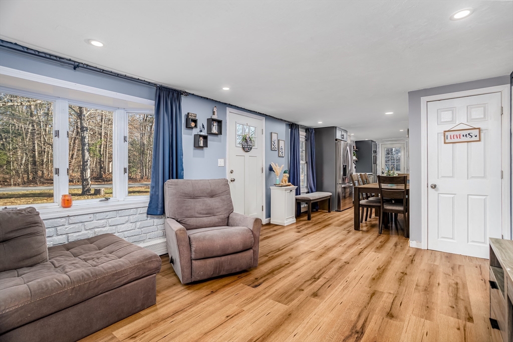 18 Corey Hill Road Ashburnham, MA 01430 - Photo 16 of 40 a living room with furniture and a wooden floor