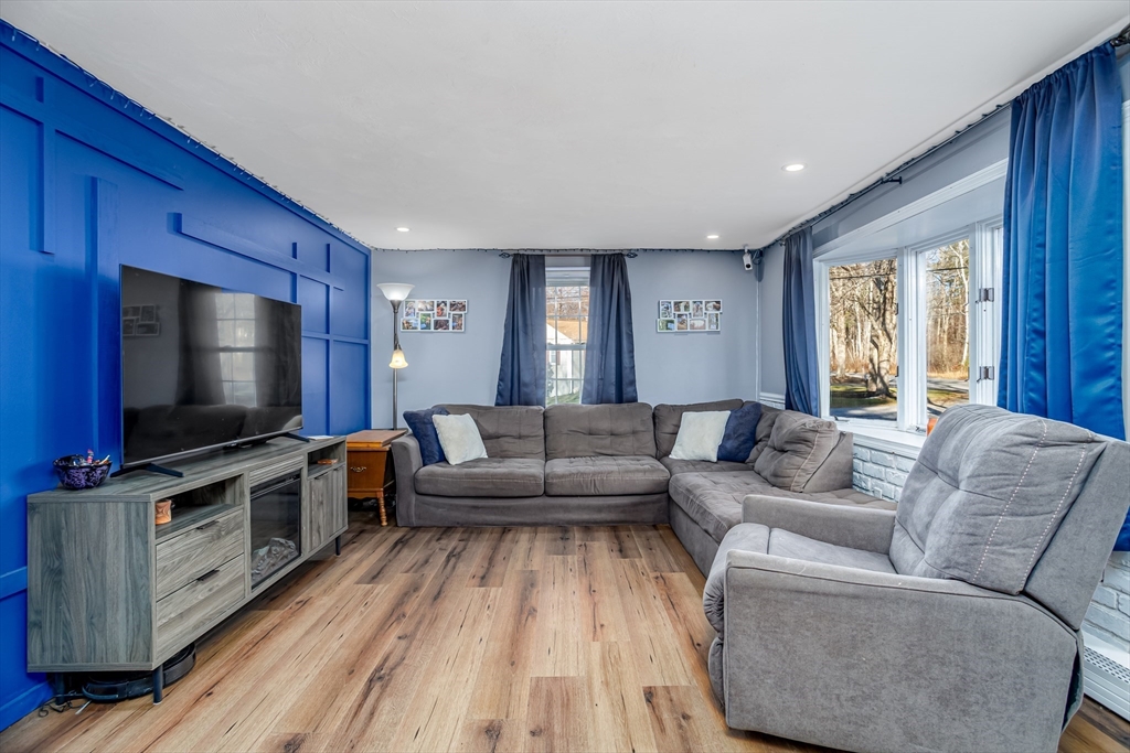 18 Corey Hill Road Ashburnham, MA 01430 - Photo 18 of 40 a living room with furniture and a flat screen tv