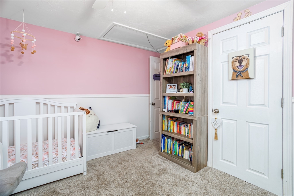 18 Corey Hill Road Ashburnham, MA 01430 - Photo 21 of 40 a livingroom with a book shelf
