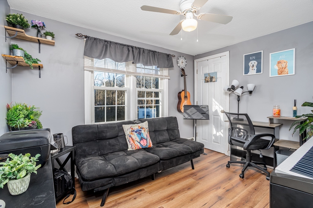 18 Corey Hill Road Ashburnham, MA 01430 - Photo 23 of 40 a living room with furniture and a window