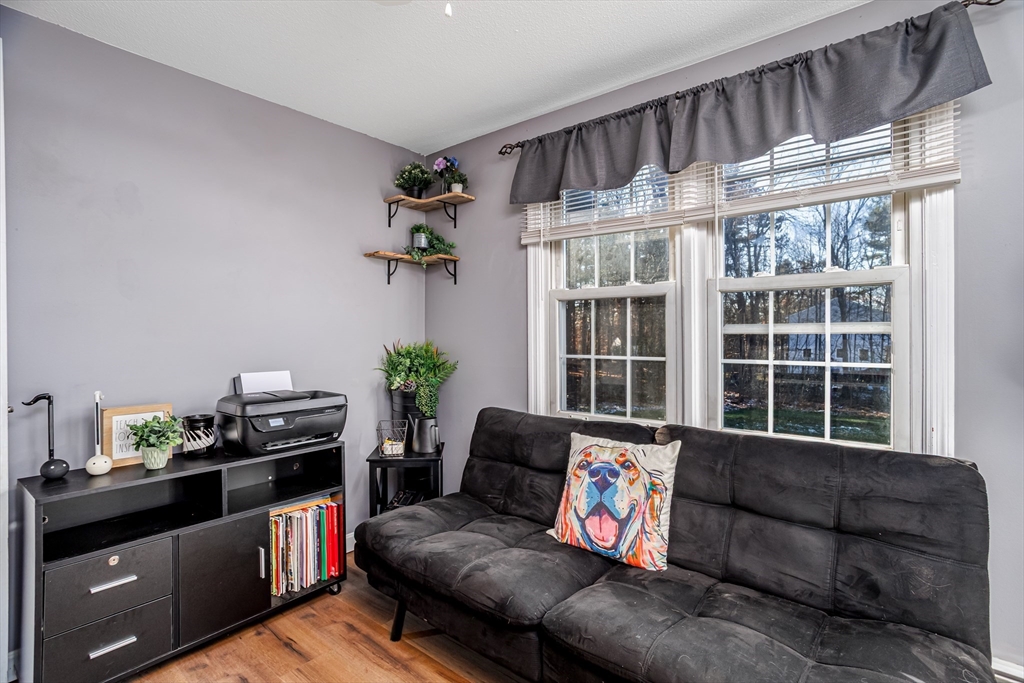 18 Corey Hill Road Ashburnham, MA 01430 - Photo 25 of 40 a living room with furniture and a window