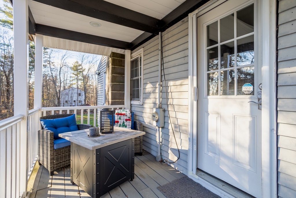 18 Corey Hill Road Ashburnham, MA 01430 - Photo 6 of 40 a view of a kitchen with granite countertop a sink and a refrigerator