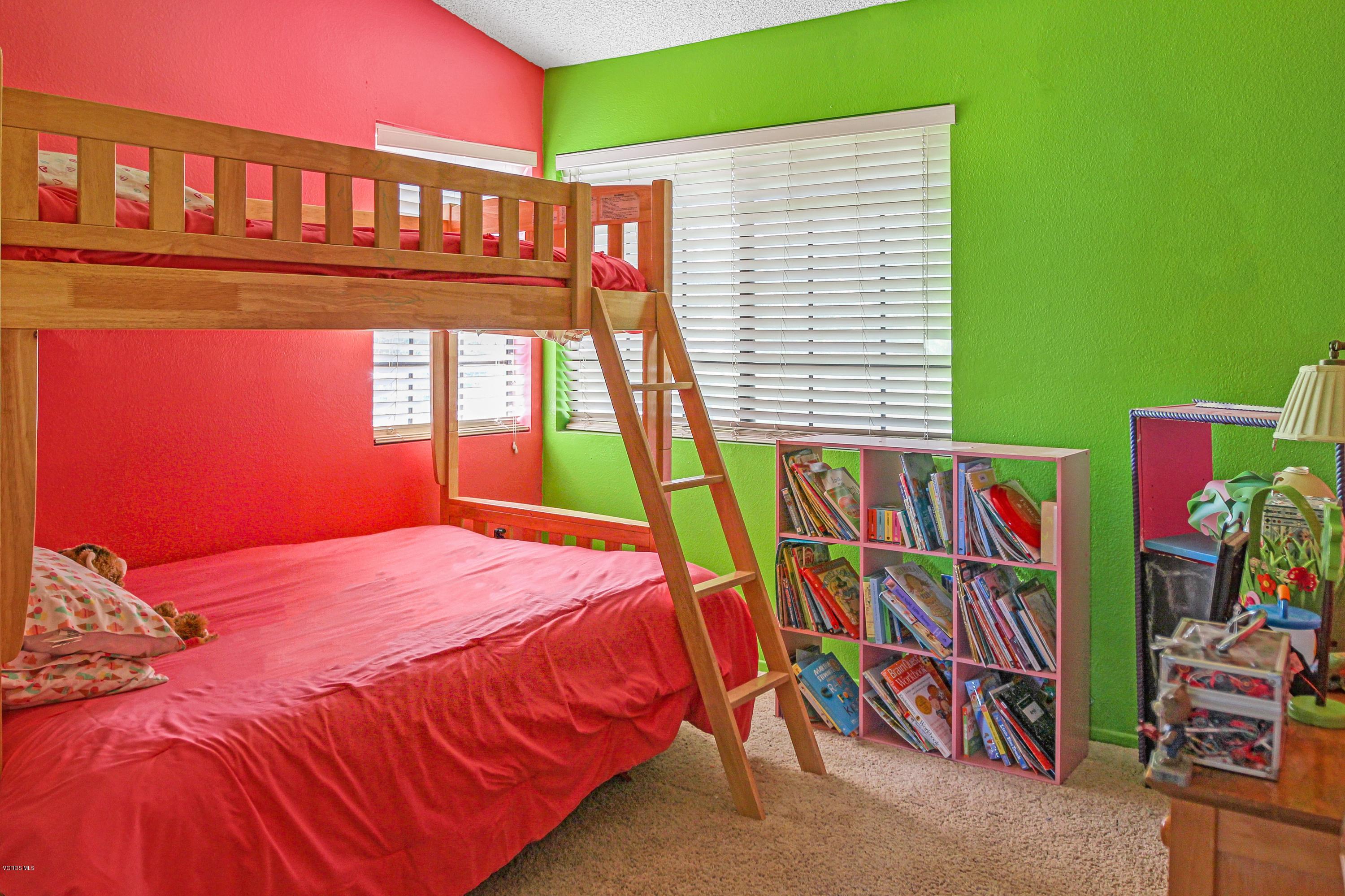 3534 Olds Road Oxnard, CA 93033 - Photo 14 of 14 a bedroom with a bed and a book shelf