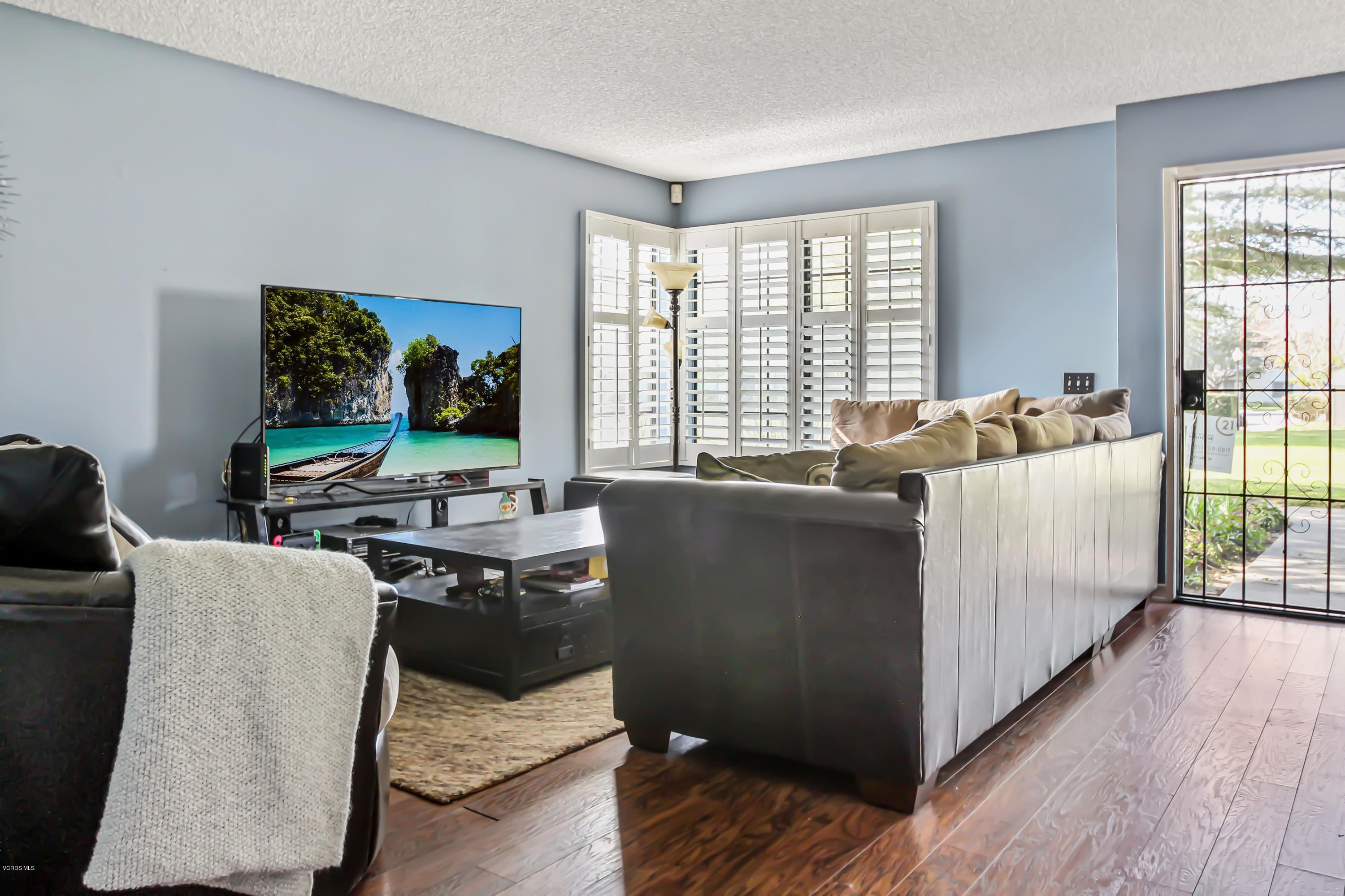 3534 Olds Road Oxnard, CA 93033 - Photo 6 of 14 a living room with furniture and a flat screen tv