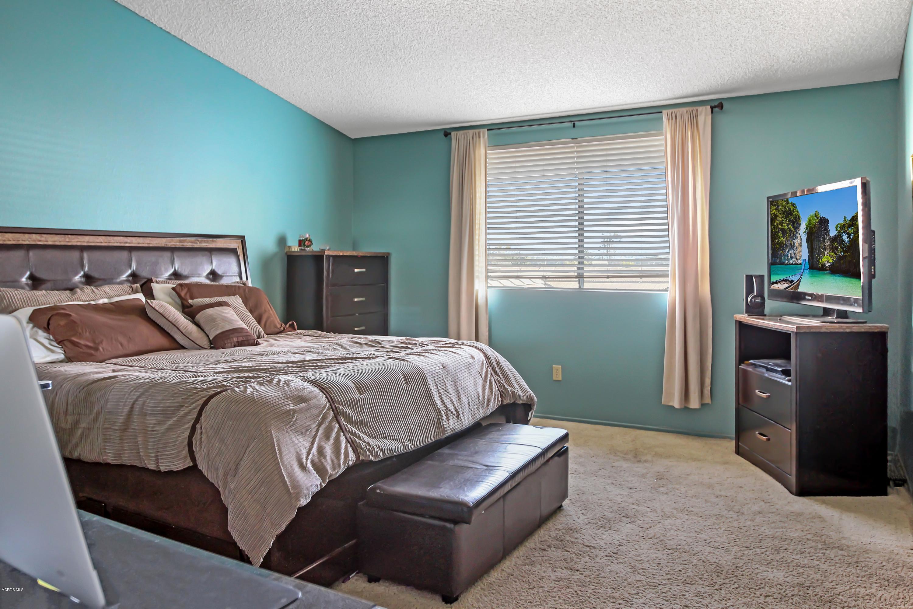 3534 Olds Road Oxnard, CA 93033 - Photo 10 of 14 a bedroom with a bed and dresser