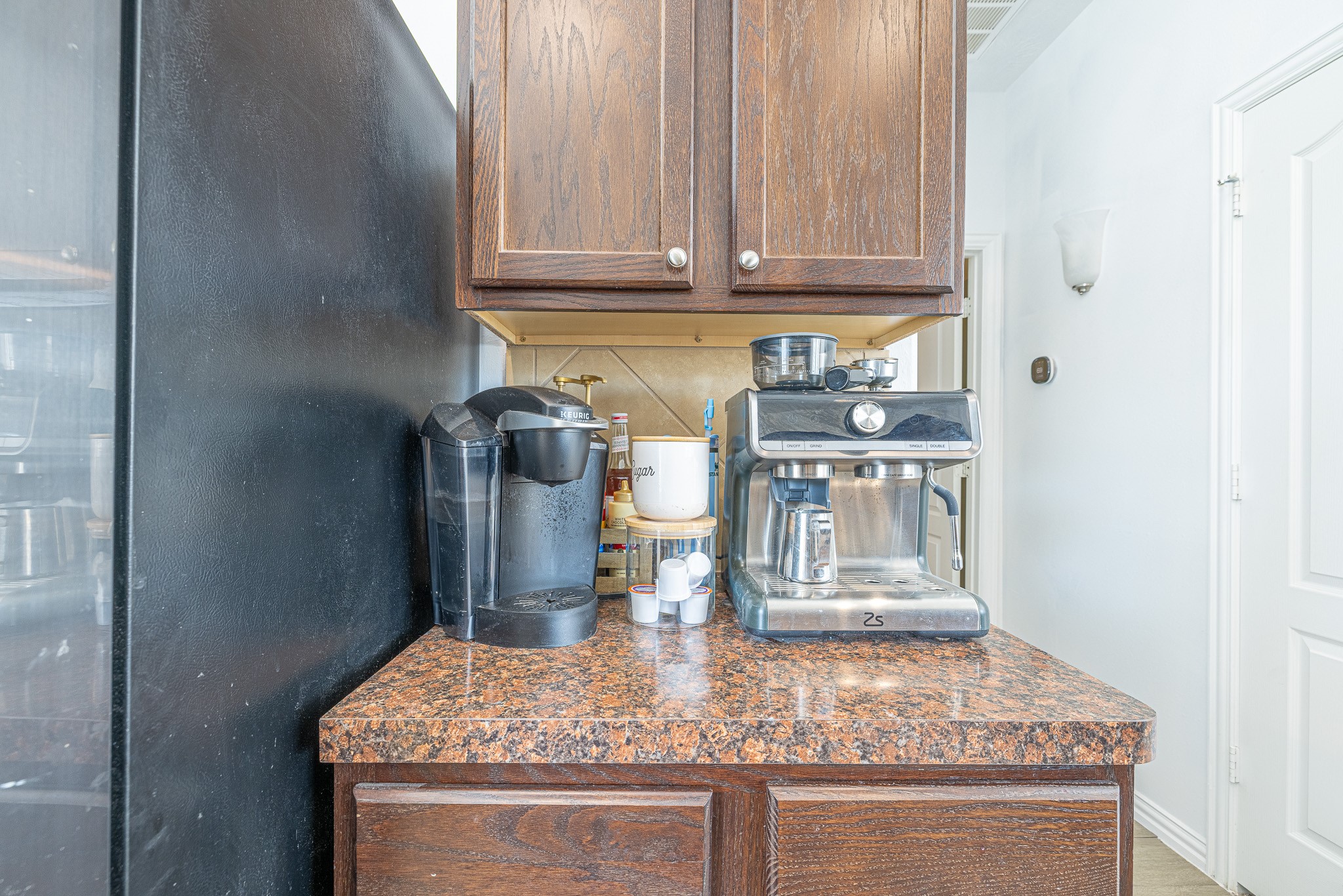 3818 Hunters Trail Baytown, TX 77521 - Photo 12 of 32 a view of kitchen island with granite countertop