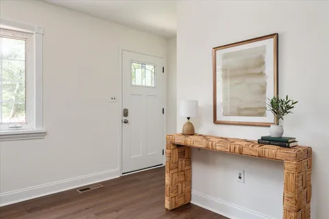 a room with table and window