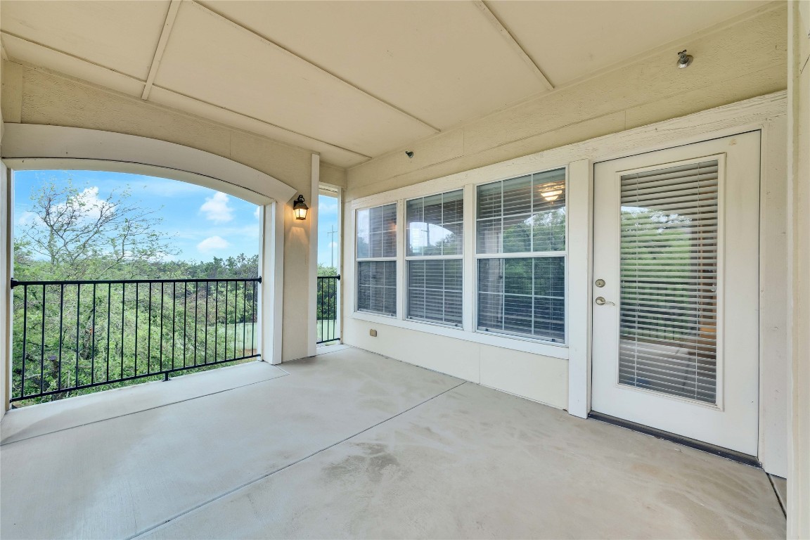 10300 Morado Cove, Unit 601 Austin, TX 78759 - Photo 12 of 20 a view of a room with a large window