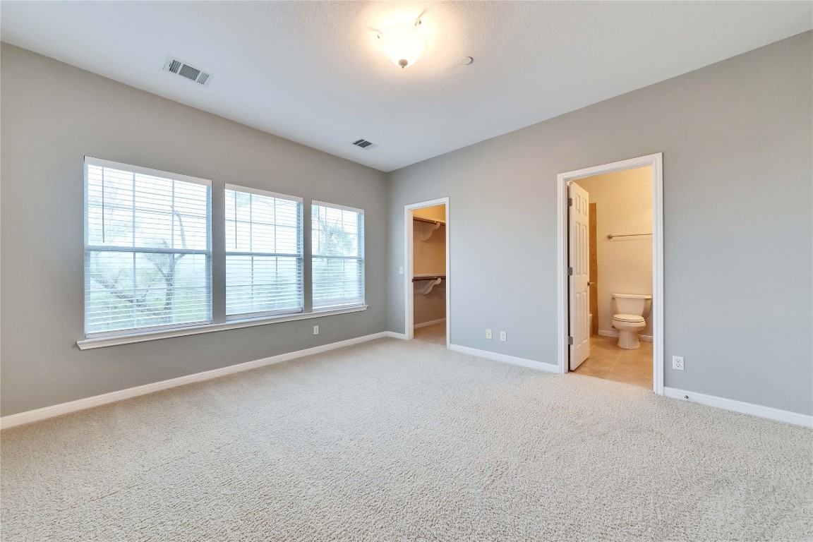10300 Morado Cove, Unit 601 Austin, TX 78759 - Photo 14 of 20 a view of an empty room with a window