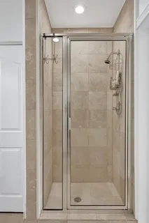 a view of a house with swimming pool and a yard