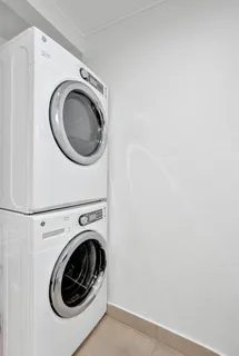 a bathroom with a tub and shower