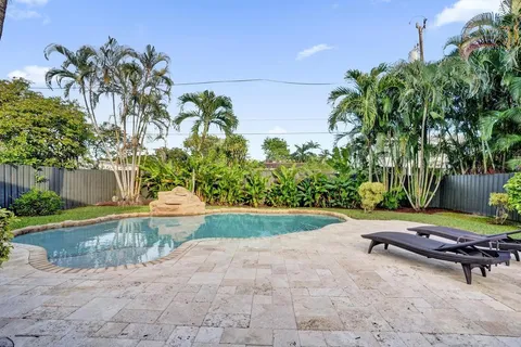 an aerial view of a city with lots of residential buildings