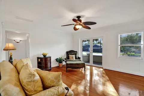 a kitchen with stainless steel appliances granite countertop a refrigerator and stove top oven