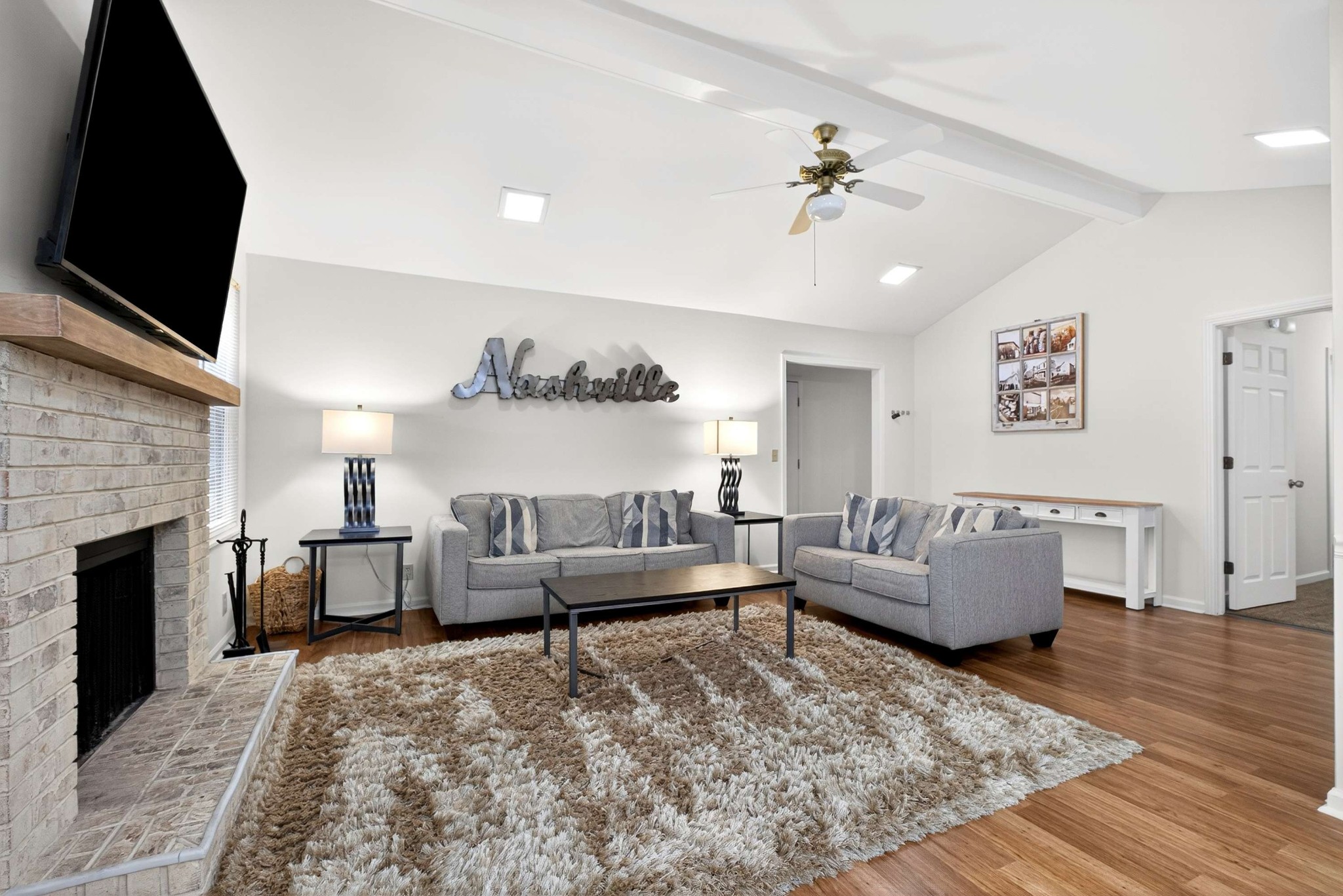 205 Stoneyway Court Nolensville, TN 37135 - Photo 13 of 41 a living room with furniture and a fireplace