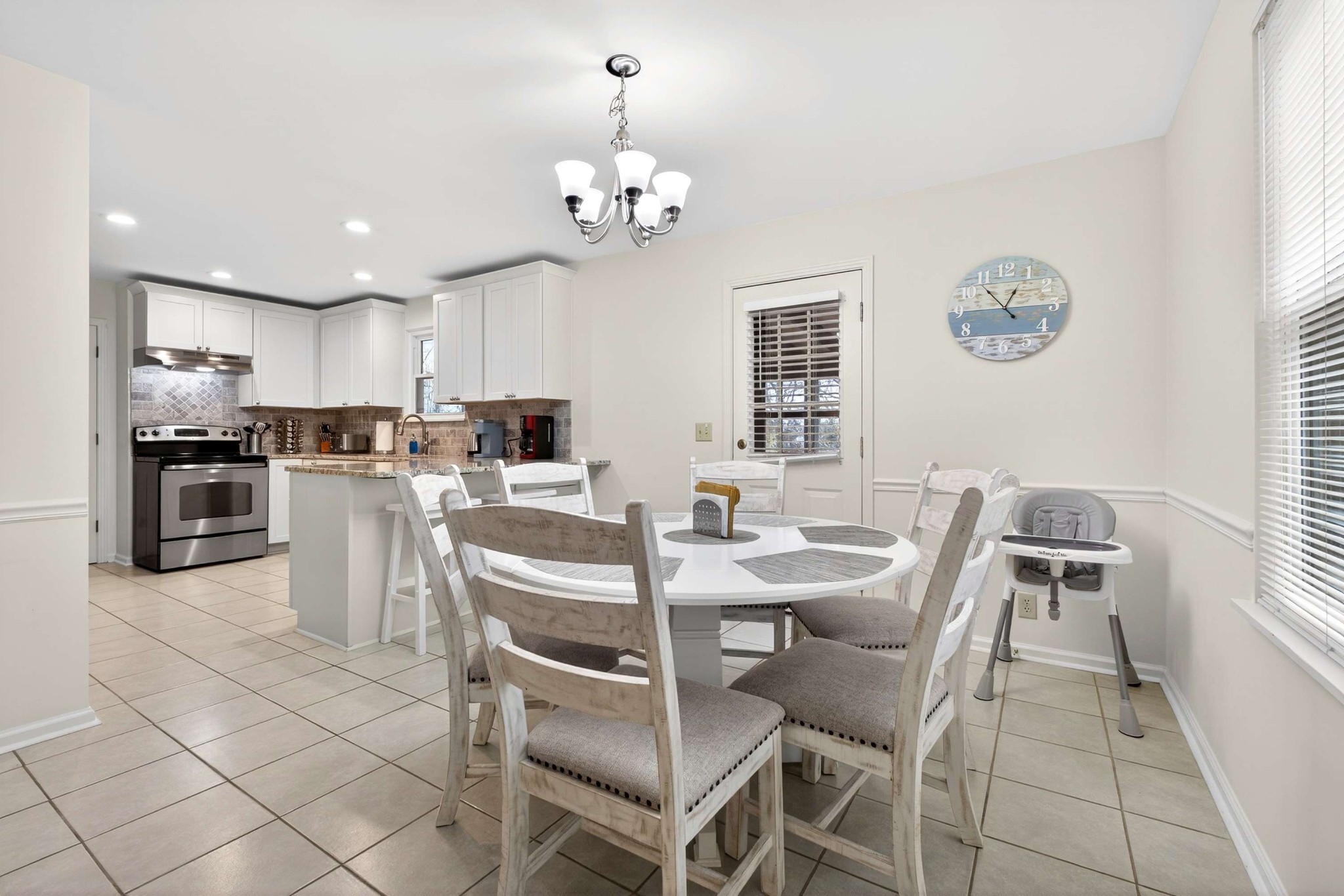 205 Stoneyway Court Nolensville, TN 37135 - Photo 17 of 41 a view of a dining room with furniture and chandelier
