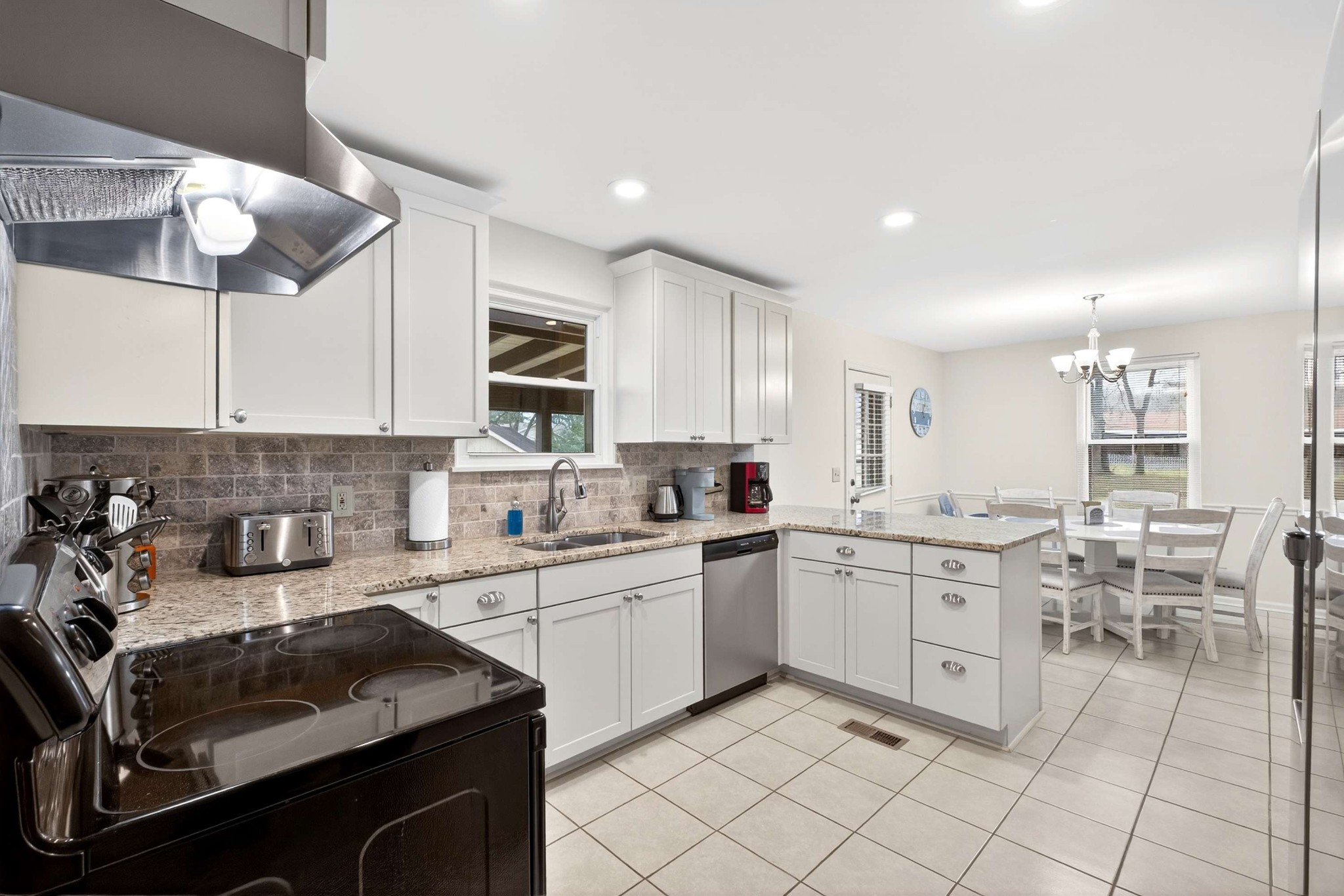 205 Stoneyway Court Nolensville, TN 37135 - Photo 20 of 41 a kitchen with a sink window and cabinets