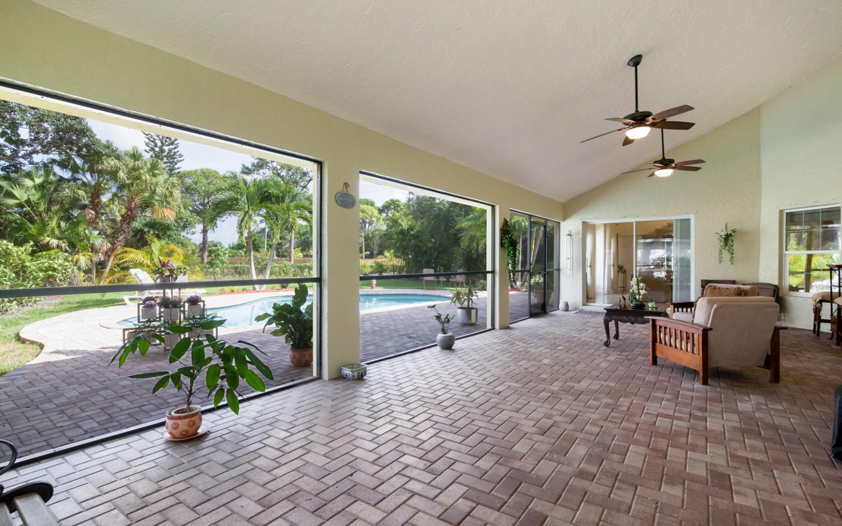 5841 River Isle Road Jupiter, FL 33458 - Photo 17 of 20 5841 River Isle.Covered Patio