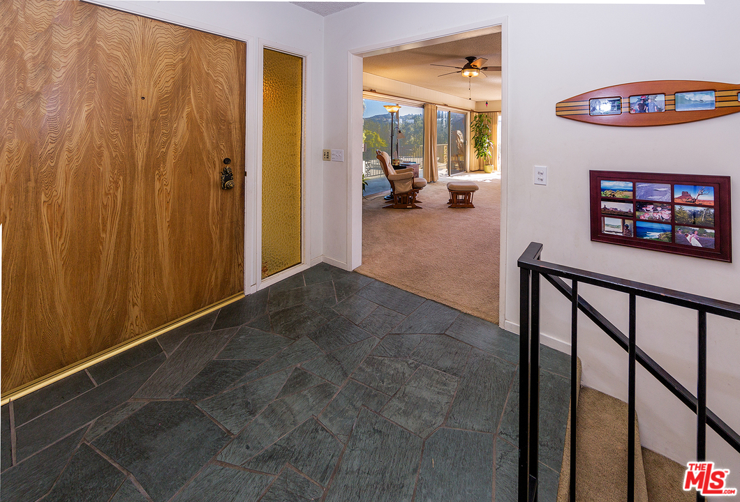 3088 Paddington Road Glendale, CA 91206 - Photo 11 of 17 a view of a livingroom with furniture and windows